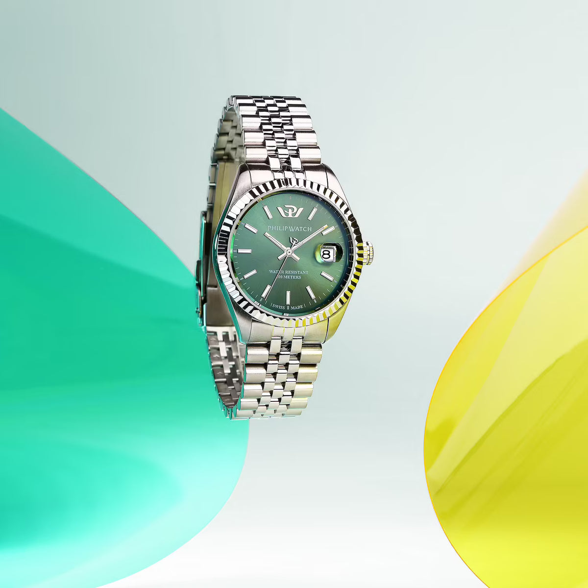 orologio da donna con movimento al quarzo eta f05.115 e funzioni di solo tempo con data.
cassa in acciaio inox dal diametro di 35mm. lunetta zigrinata.
fondello e corona a vite per garantire maggiore impermeabilità.
quadrante analogico verde con indici a bastoni, logo a ore 12 e datario a ore 3 con lente di ingrandimento.
vetro zaffiro.
cinturino in acciaio anallergico; chiusura deployante con pulsanti.
resistente all'acqua fino a 100 metri di profondità.
appartiene alla collezione caribe urban.