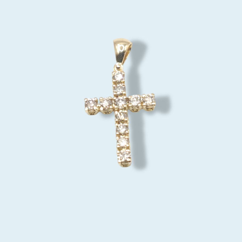 Croce n oro giallo con diamanti di Meteore gioielli. Linea classica