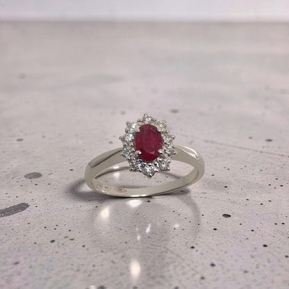 Anello in oro bianco 18Kt con rubino naturale 0.55 ct e diamanti naturali 0.22 ct firmato Meteore Gioielli