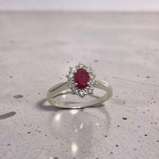 Anello in oro bianco 18Kt con rubino naturale 0.55 ct e diamanti naturali 0.22 ct firmato Meteore Gioielli