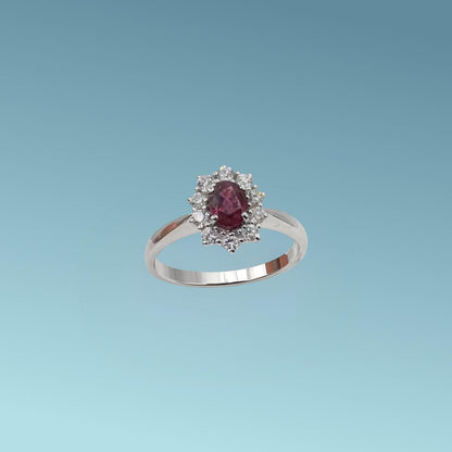Anello oro bianco 18ct con Rubino da 0.60 carati e diamanti naturali di 0.34 carati realizzato da Meteore Gioielli