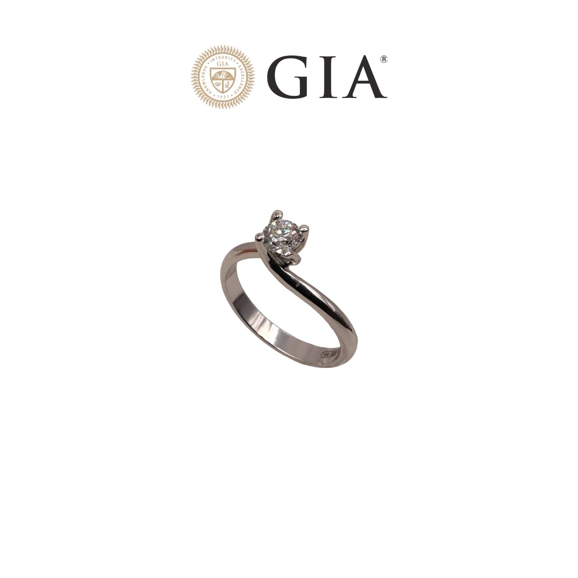 Anello Solitario in oro bianco 18kt di Meteore Gioielli con diamante naturale taglio brillante 0.40ct E/VS1 con certificato  GIA e incisione laser sulla cintura