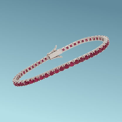 Bracciale tennis in oro bianco 18kt da cm 18 di Meteore Gioielli con rubini naturali taglio brillante di 4.70 ct incassati su una montatura a filo diritto