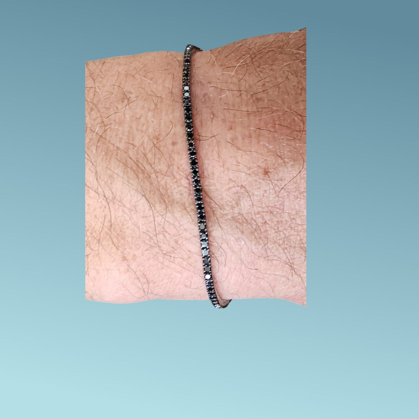 bracciale tennis in oro bianco con diamanti neri di carati 2.13 con punte brunite. lunghezza 19cm di meteore gioielli 