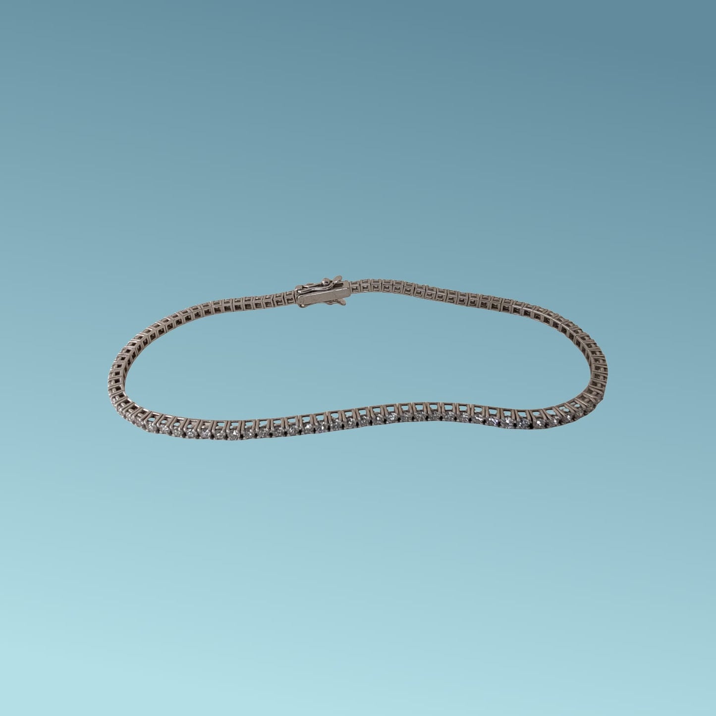 bracciale tennis in oro bianco 18kt di meteore gioielli con diamanti naturali taglio brillante ct 1.71 g/vs, incassati su castoni a griffes su base quadra