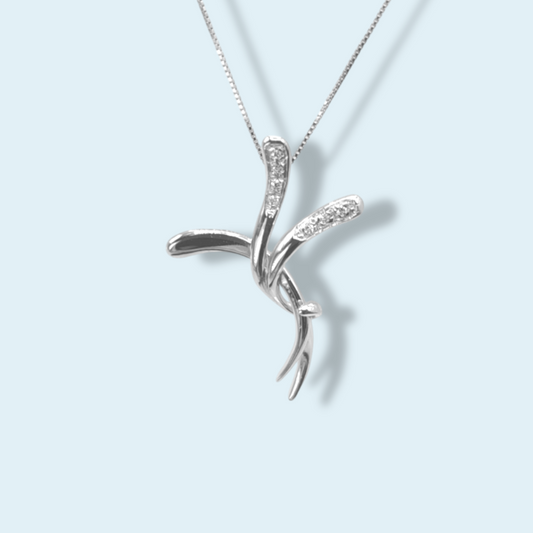 Collana con croce di Meteore gioielli dalle forme sinuose impreziosita da diamanti