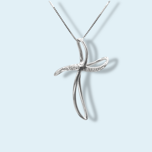 Collana con croce di meteore gioielli dalle forme ondeggianti e arricchita con diamanti. oro bianco 18 carati.