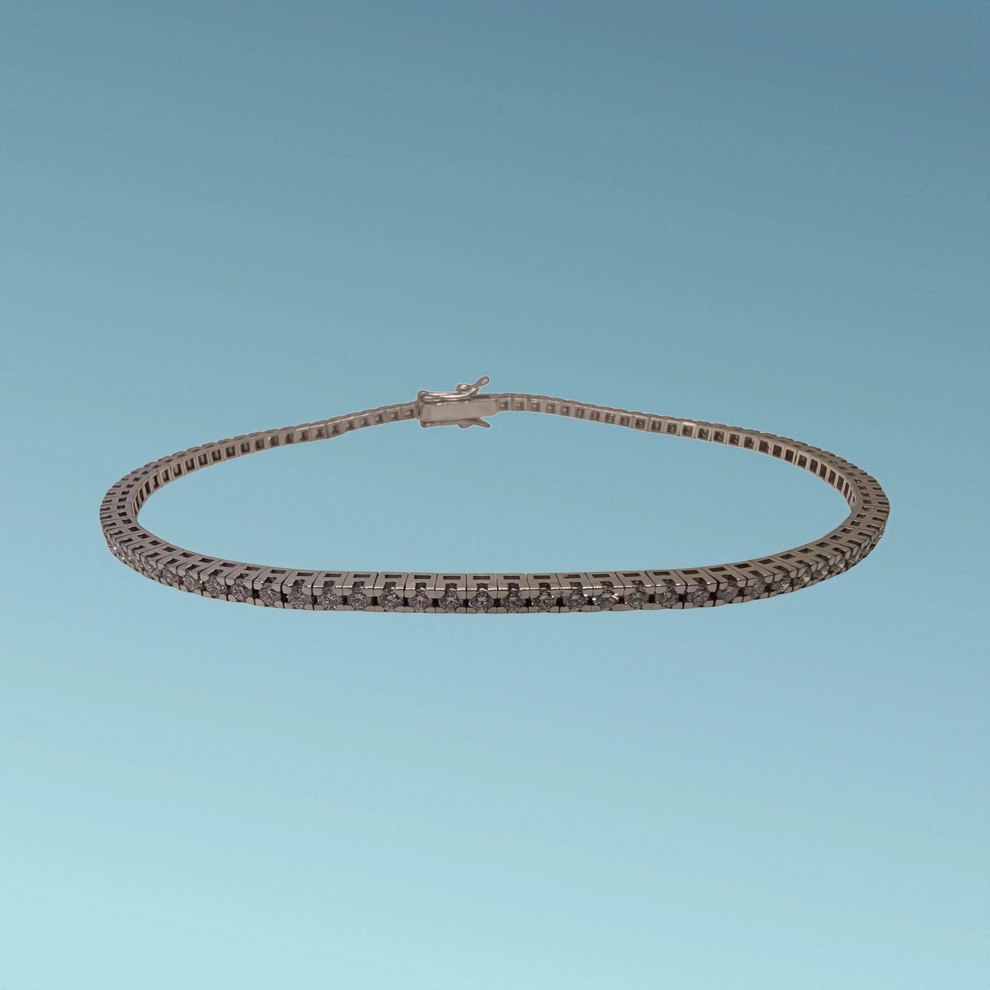 bracciale tennis di meteore gioielli in oro 18kt con diamanti naturali di ct 1.47 incassati su un castone “tornito” 