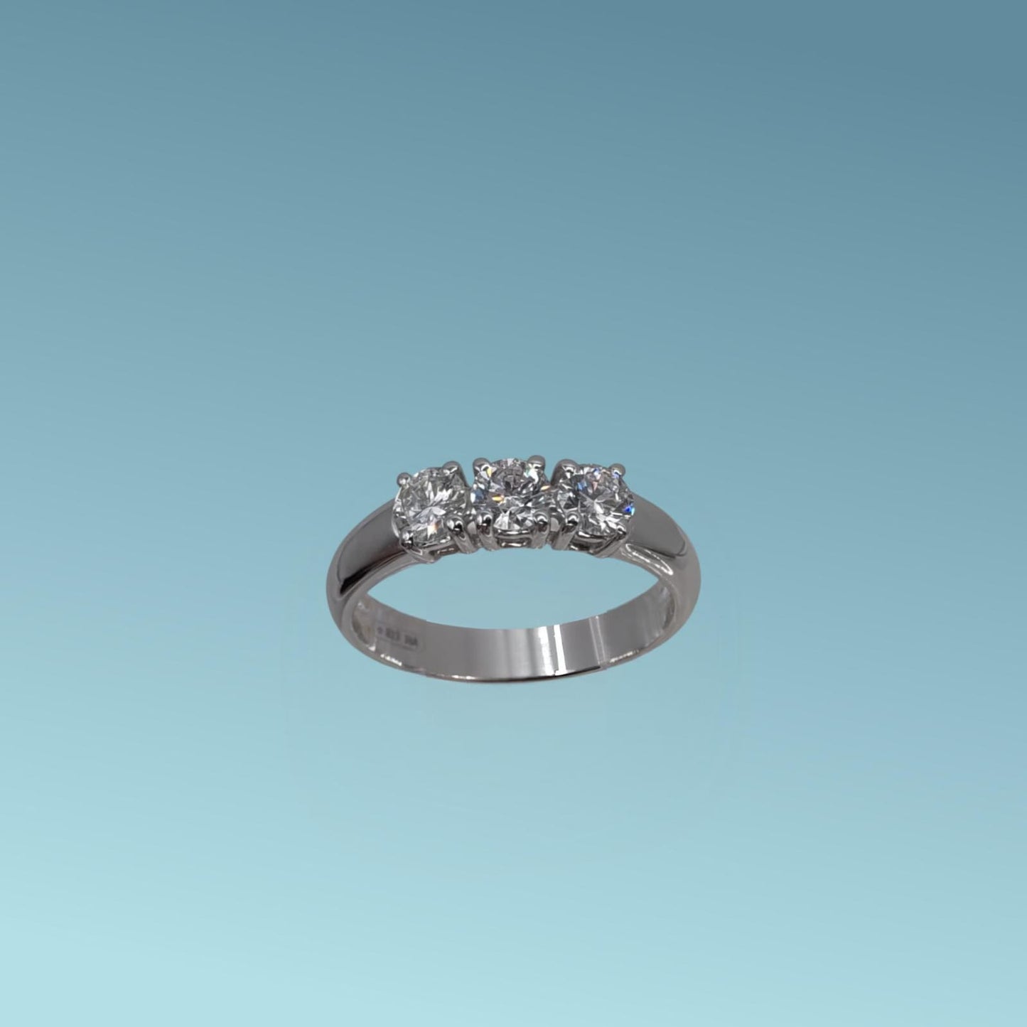 anello trilogy in oro e diamanti