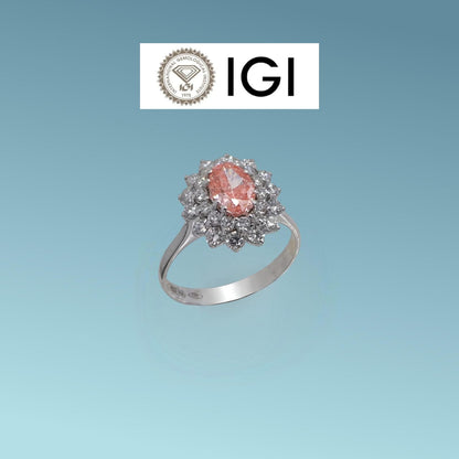 Anello in oro bianco 18kt di Meteore Gioielli con Diamante di Laboratorio Fancy Vivid Pink&nbsp; 0.81 ct dal taglio ovale, corredato dell'importante certificazione internazionale IGI 