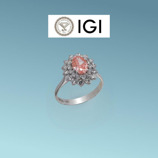 Anello in oro bianco 18kt di Meteore Gioielli con Diamante di Laboratorio Fancy Vivid Pink&nbsp; 0.81 ct dal taglio ovale, corredato dell'importante certificazione internazionale IGI 