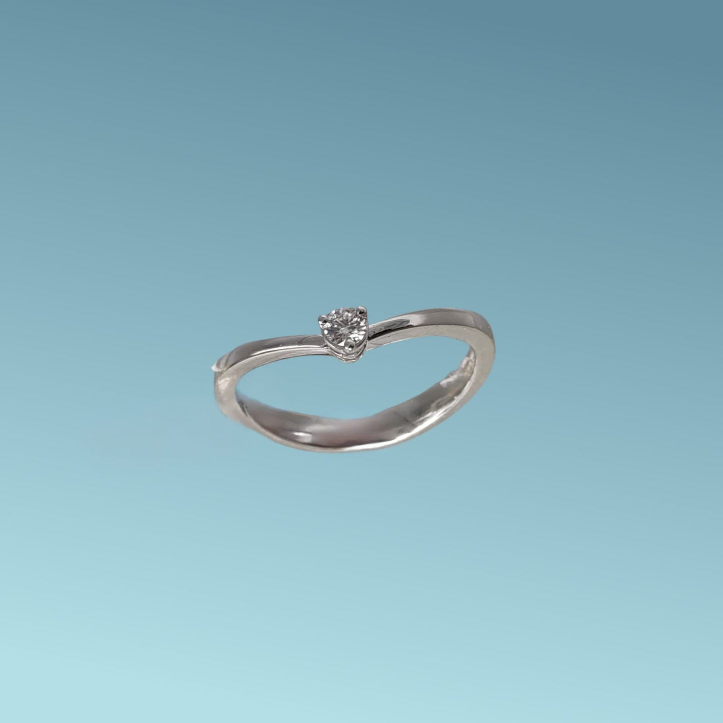 anello solitario in oro bianco 18kt di meteore gioielli con diamante naturale taglio brillante 0.09 carati g/vs. simbolo di amore e unione. perfetto per proposte di fidanzamento