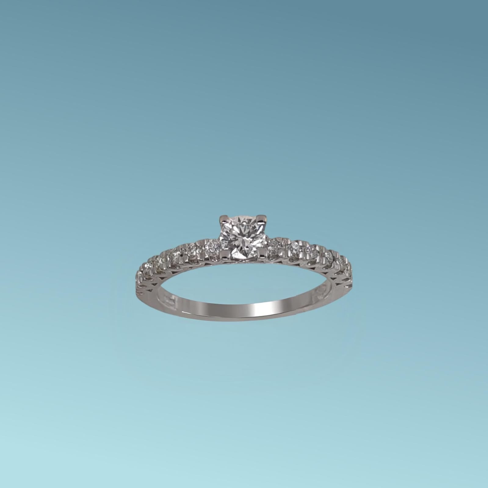 Anello Solitario in oro bianco 18kt di Meteore Gioielli con diamante naturale taglio brillante ct 0.27 al centro e ct 0.28 G/VS sul gambo
