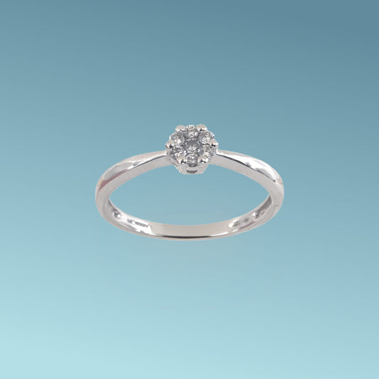 Anello Solitario in oro bianco 18kt di Meteore Gioielli presenta diamanti naturali incassati su un castone "Magic" che da l'illusione di un unica pietra