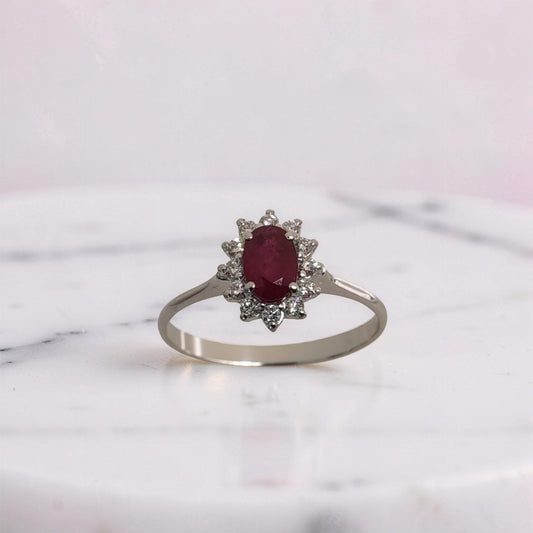 Anello in oro bianco 18Kt con rubino naturale da 0.66 ct e diamanti Meteore Gioielliù