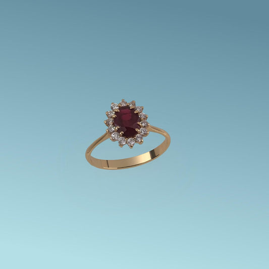 Anello in oro rosa 18kt di Meteore Gioielli con rubino naturale taglio ovale ct 0.89 incassato&nbsp; su un cesello a sei griffes contornato da diamanti naturali taglio brillante ct 0.23