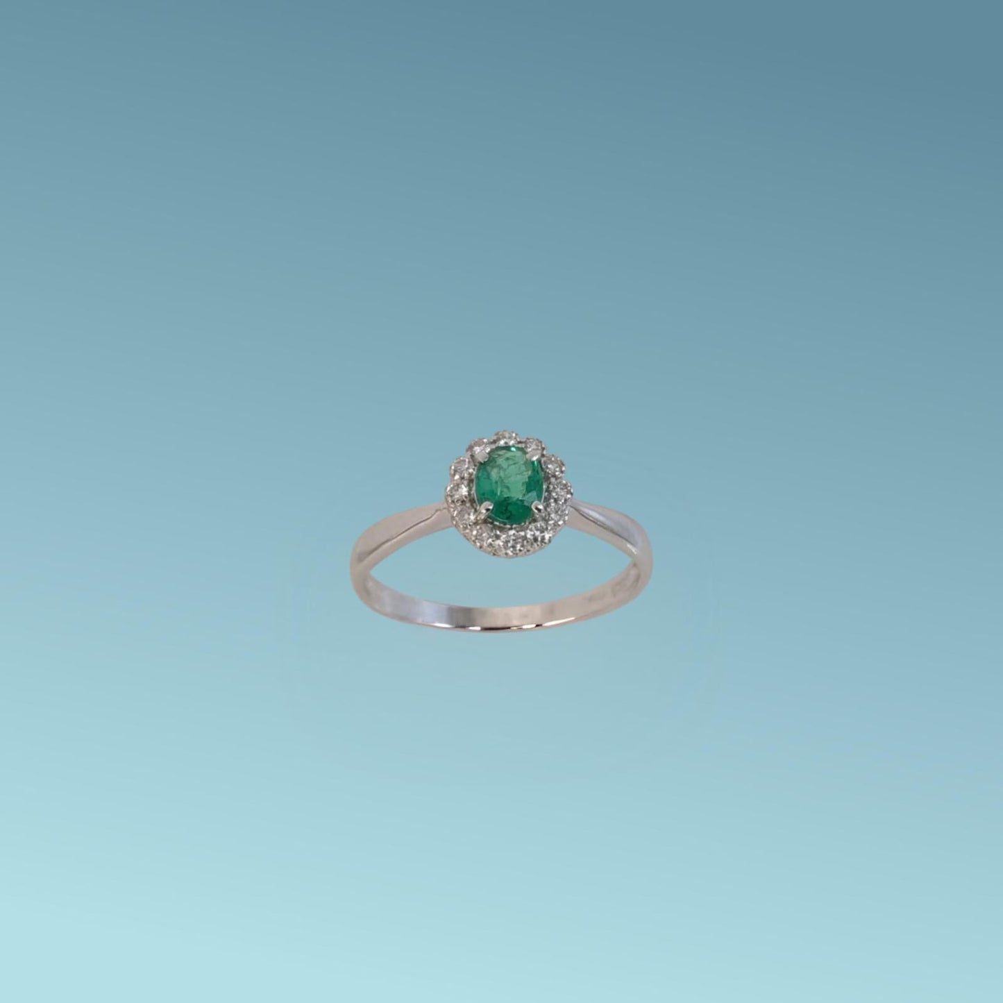anello in oro bianco 18kt di meteore gioielli con smeraldo naturale ct 0.30 e un contorno di diamanti naturali taglio brillante ct 0.12 g/vs