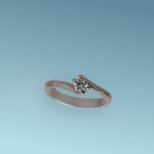 Anello Solitario in oro bianco 18kt di Meteore Gioielli con diamante naturale taglio brillante ct 0.20 G/VVS.