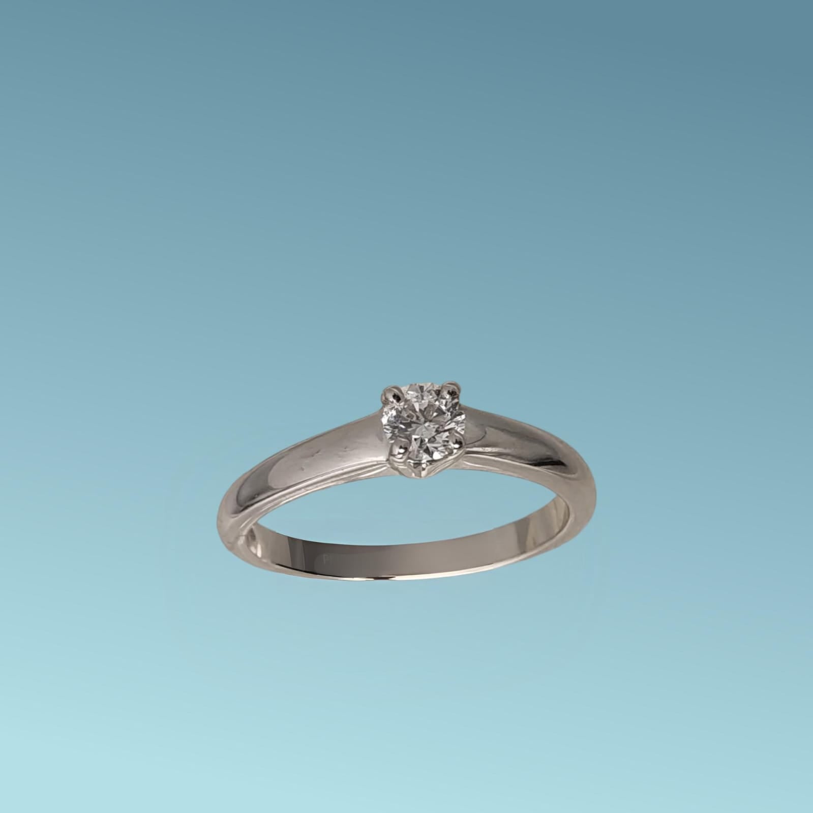 Anello Solitario in oro bianco 18kt di Meteore Gioielli con diamante naturale taglio brillante ct 0.25 G/VS.