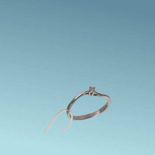 Anello Solitario in oro bianco 18kt di Mirco Visconti con diamante naturale taglio brillante 0.03 carati G/VS. Simbolo di amore e unione. Perfetto per proposte di fidanzamento
