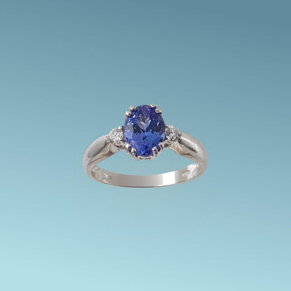 Anello in oro bianco 18kt di Meteore Gioielli con Tanzanite naturale taglio ovale ct 1.37 e due diamanti naturali taglio brillante G/VS ct 0.12