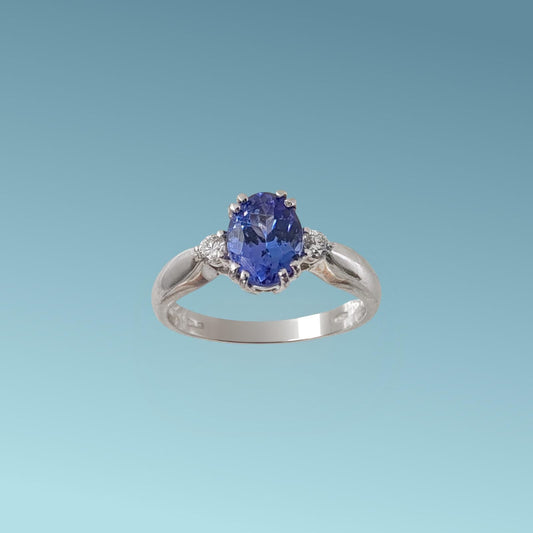 Anello in oro bianco 18kt di Meteore Gioielli con Tanzanite naturale taglio ovale ct 1.37 e due diamanti naturali taglio brillante G/VS ct 0.12