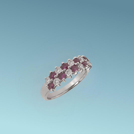 Anello con due file alternando i rubini e diamanti naturali taglio brillante rispettivamente di ct 0.56 e 0.38 G/VS