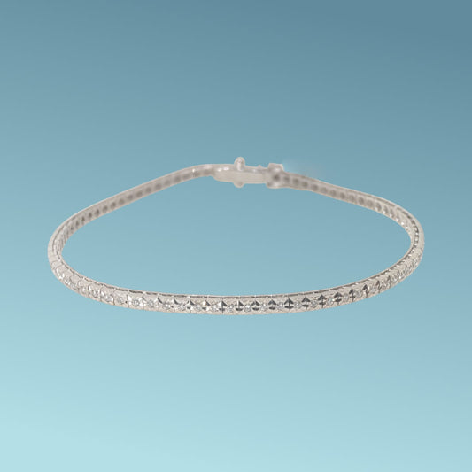 Bracciale tennis in oro bianco 18kt di Meteore Gioielli con diamanti naturali taglio brillante ct 0.42 G/VS incassati su montatura con castoni a piramide su base quadra 