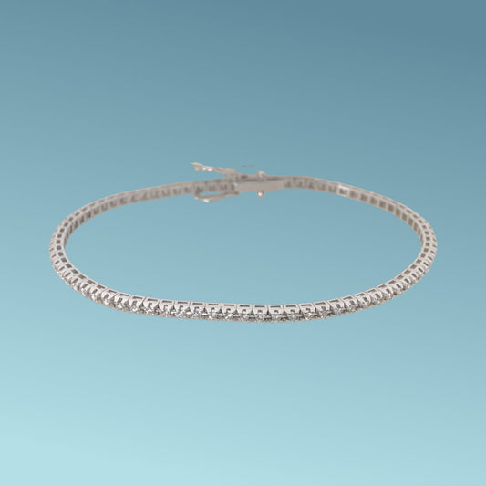 Bracciale tennis in oro 18kt di Meteore Gioielli con diamanti taglio brillante incassati su una montatura con castoni a piramide