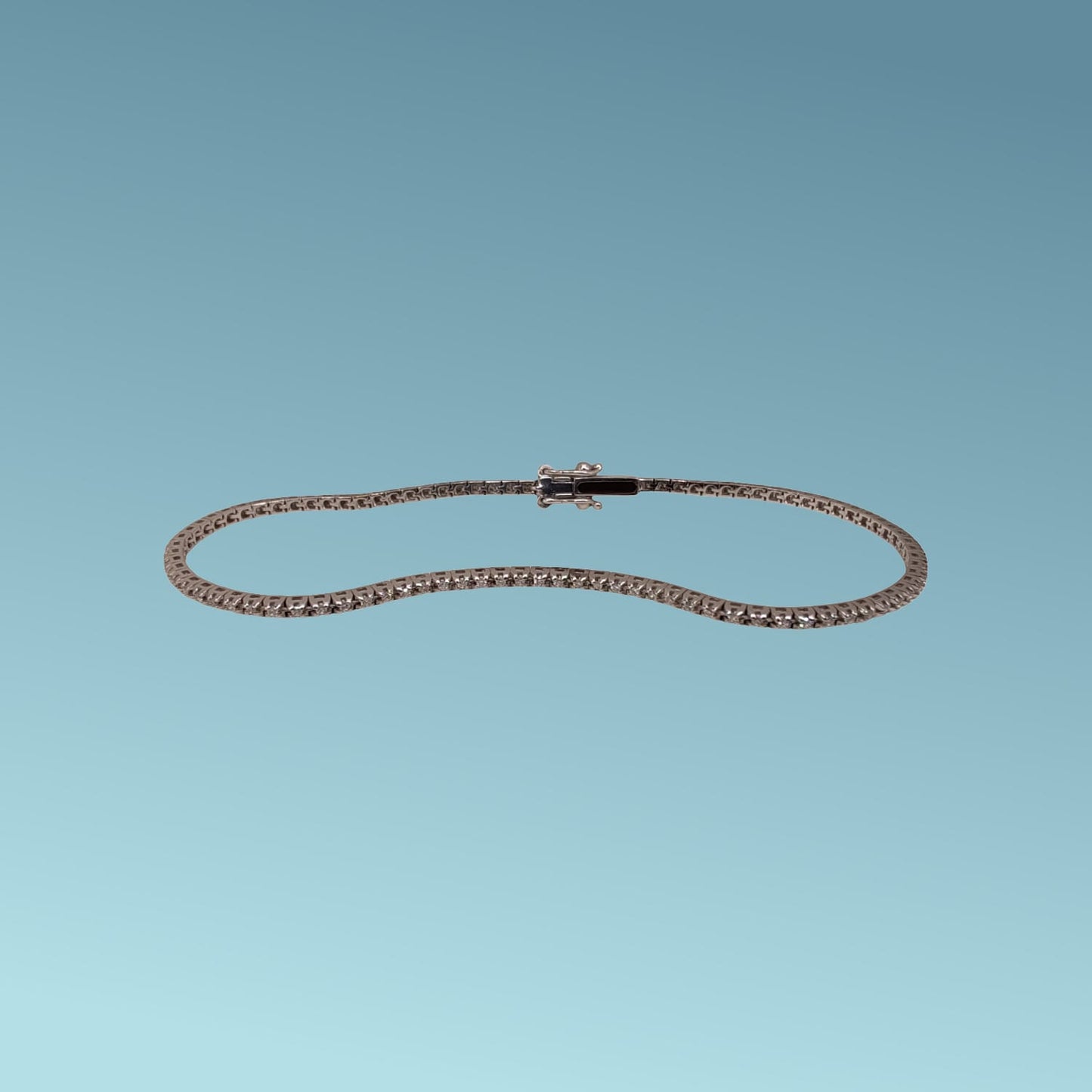 bracciale tennis in oro 18kt di meteore gioielli con diamanti taglio brillante di 0,28 carati incassati su una montatura con castoni a piramide che ne esaltano la luminosità