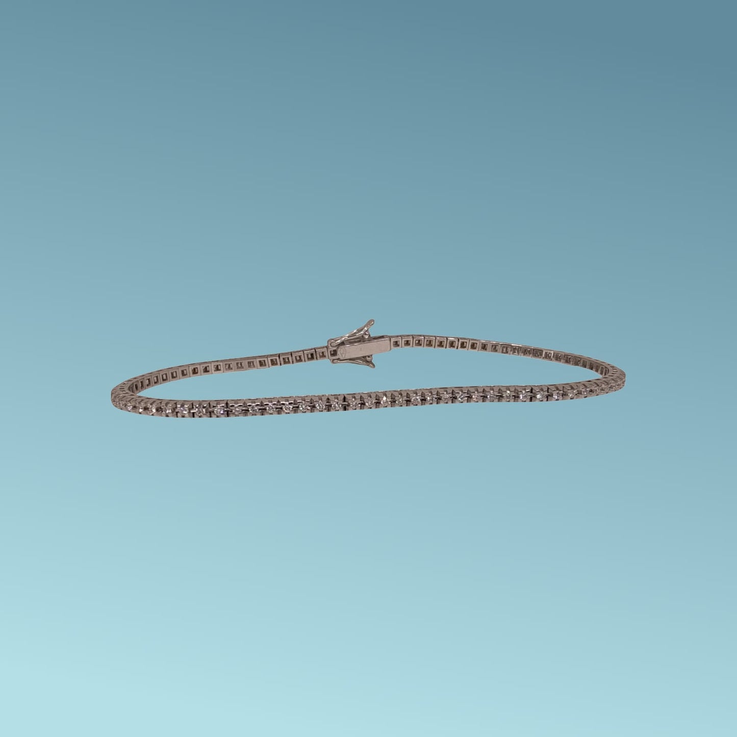 bracciale tennis in oro 18kt di meteore gioielli con diamanti taglio brillante di 0,50 carati  incassati su una montatura con castoni a piramide che ne esaltano la luminosità