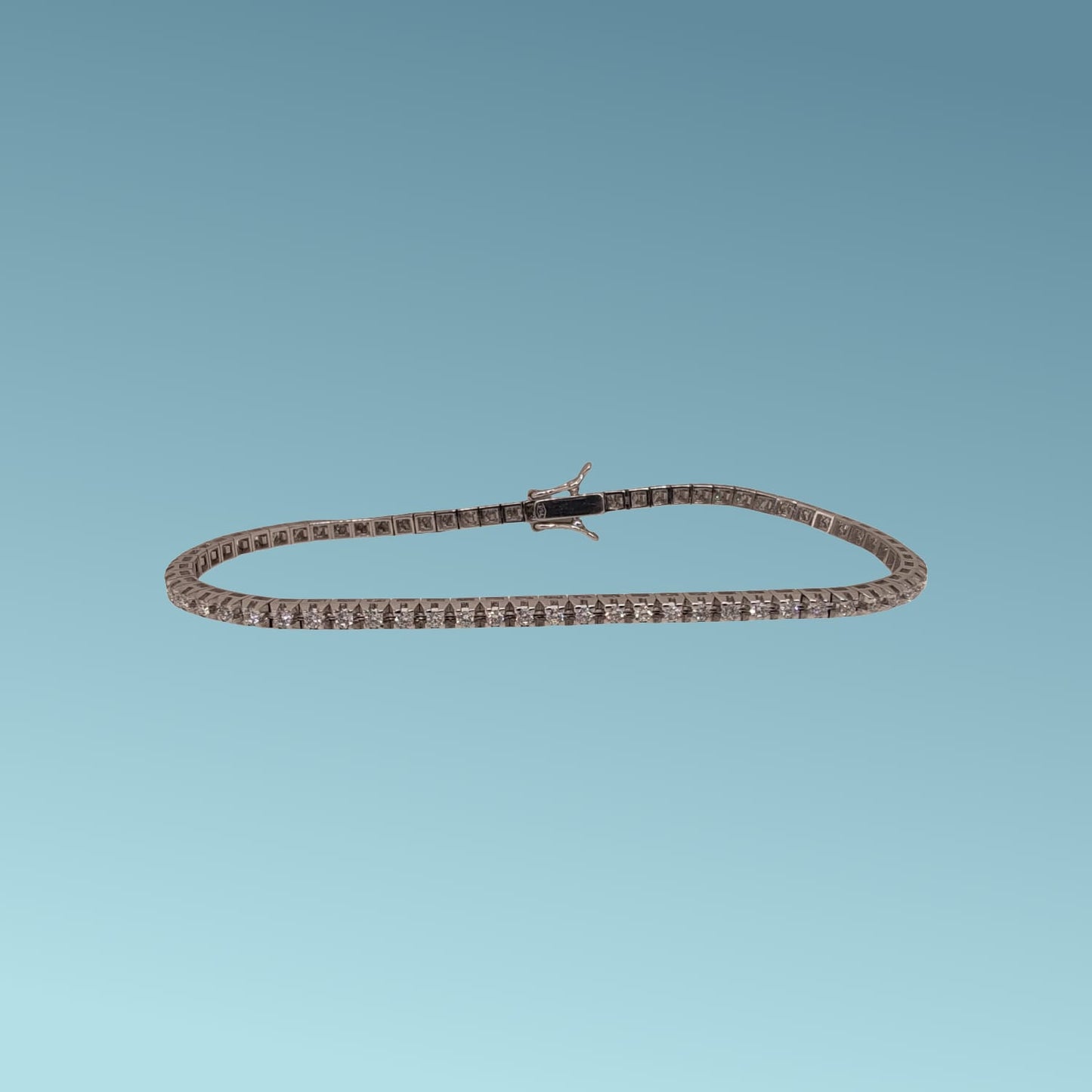 bracciale tennis in oro 18kt di meteore gioielli con diamanti taglio brillante di  1,00 carati incassati su una montatura con castoni a piramide che ne esaltano la luminosità