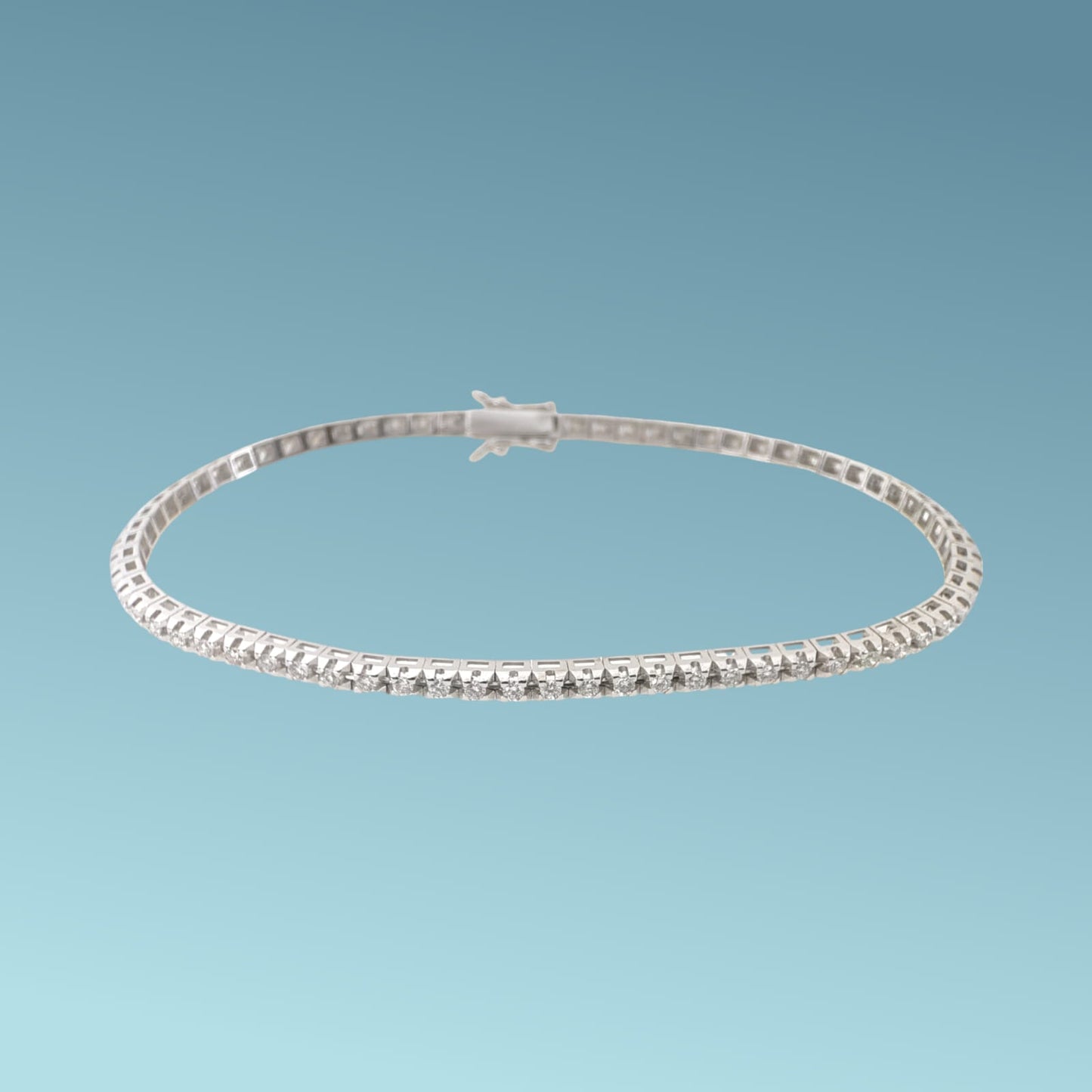 bracciale tennis in oro 18kt di meteore gioielli con diamanti taglio brillante incassati su una montatura con castoni a piramide