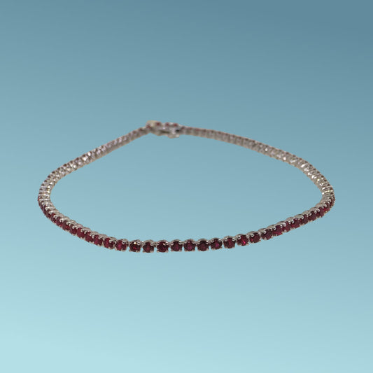 Bracciale tennis in oro bianco 18kt&nbsp; da cm 18 di Meteore Gioielli con rubini naturali taglio brillante per un totale di 2.38 ct 