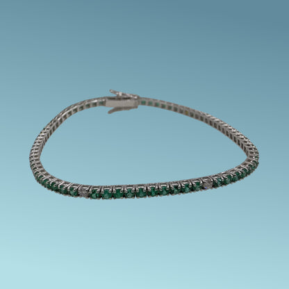 Bracciale tennis in oro bianco 18kt cm 18 di Meteore Gioielli con 7 linee di 10 smeraldi naturali taglio brillante per un totale di 2.41 ct intervallati da un diamante naturale taglio brillante per un totale di 0.18 ct