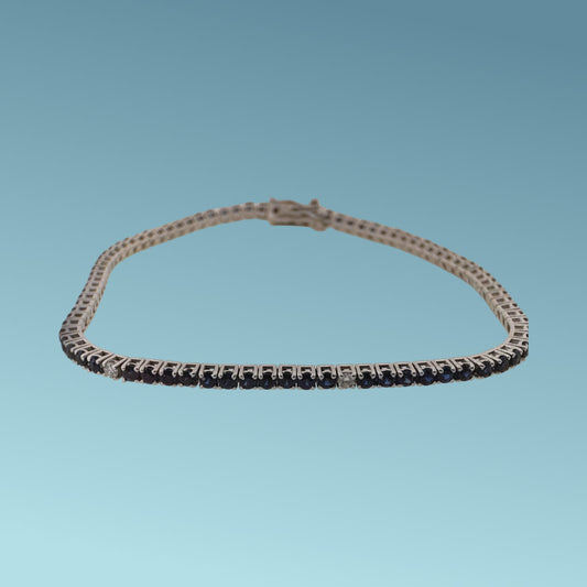 Bracciale tennis in oro bianco 18kt cm 19 di Meteore Gioielli con zaffiri naturali taglio brillante per un totale di 3.25 ct intervallati da diamanti naturali taglio brillante per un totale di 0.19 ct