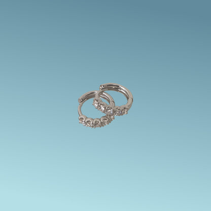Cerchi in oro bianco 18kt di Mirco Visconti con  5 diamanti naturali taglio brillante  0.63 kt G/VS.