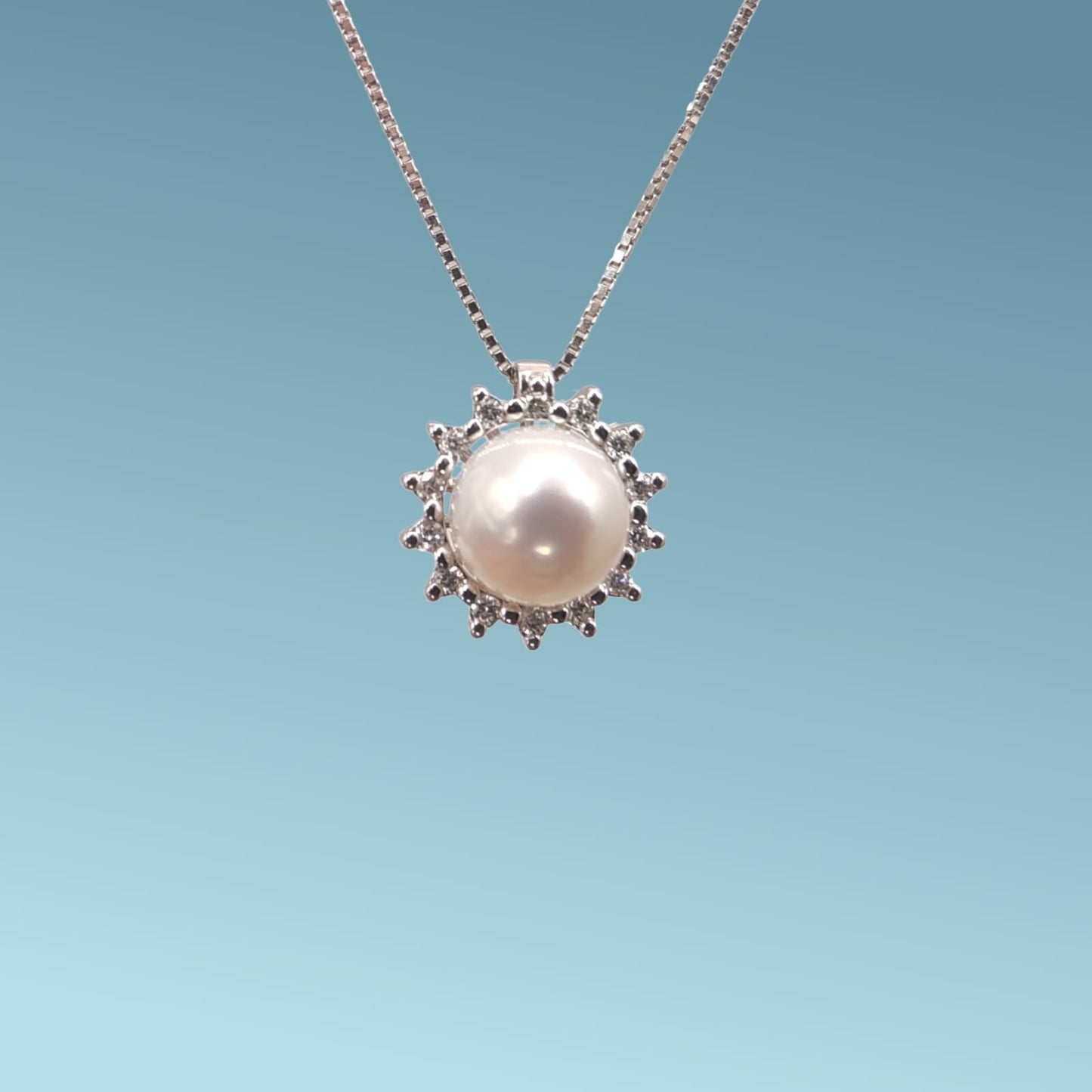 collana in oro bianco 18kt di meteore gioielli è una splendida perla coltivata fresh water di diametro 7,5-8 mm  e diamanti naturali  di 0.14 ct