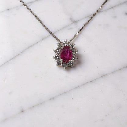 Elegante collana in oro bianco 18 Kt con rubino naturale da 0,72 ct e diamanti 0.21 ct G VS1