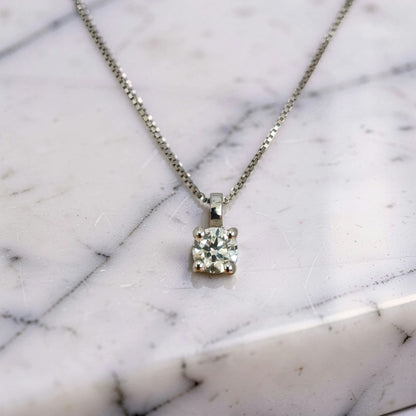 Collana Punto Luce con Diamante 0.31 ct  E color SI1, Certificato IGI 
