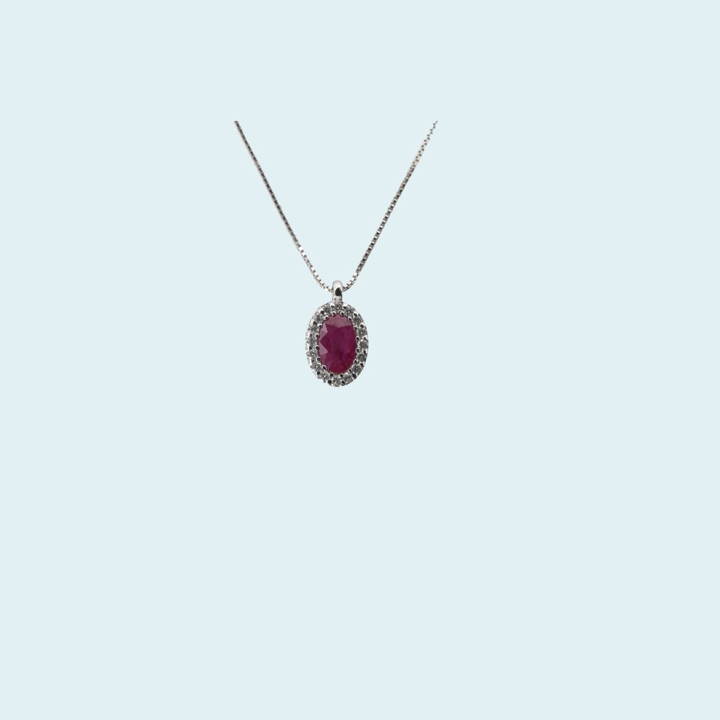 collana in oro bianco 18kt cm 45 di meteore gioielli con rubino naturale taglio ovale e contorno di diamanti naturali taglio brillante.