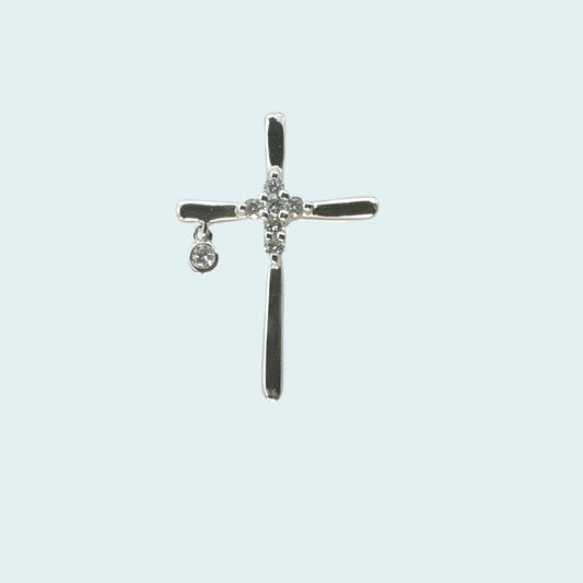 croce particolare in oro con diamanti centrali e un diamante che pende da un braccio della croca