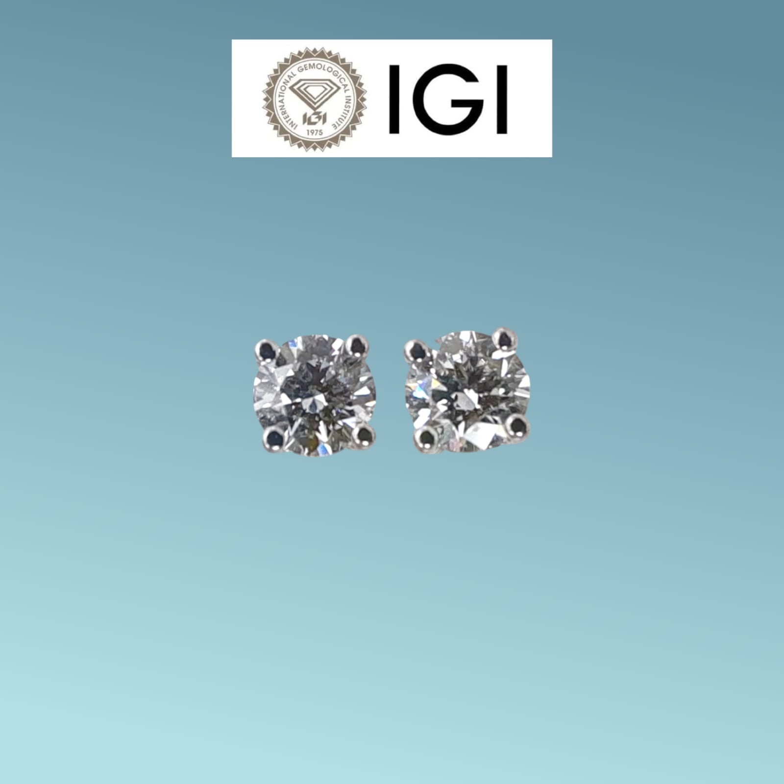 Orecchini punto luce in oro bianco 18kt di Meteore Gioielli con diamanti di laboratorio "Lab Grown" ognuno da 0.55 ct per un totale di ct 1.10 D/IF, corredati da l'importante certificato IGI 