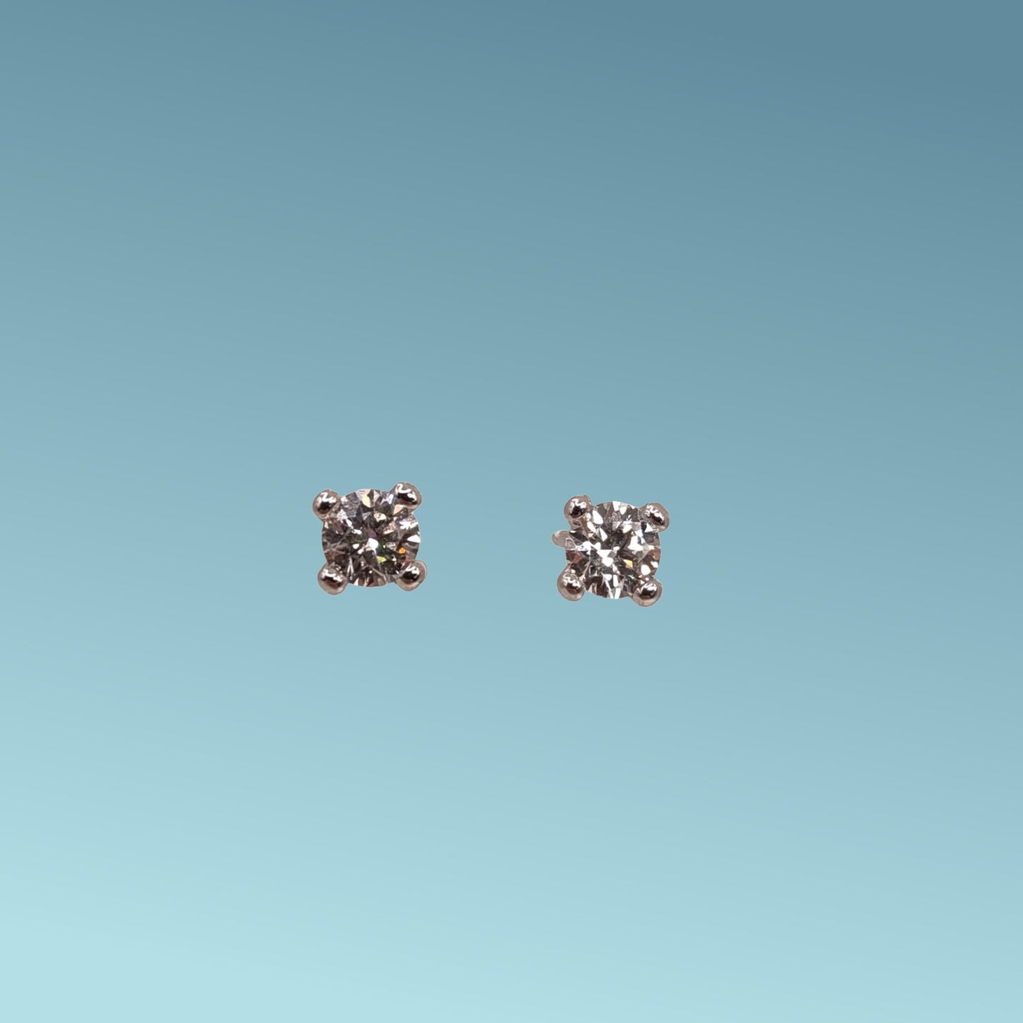 orecchini punto luce in oro bianco 18kt di meteore gioielli con coppia di diamanti naturali taglio brillante 0.64ct g/vs.