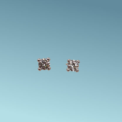 Orecchini Punto luce in oro bianco 18kt di Meteore Gioielli con coppia di diamanti naturali taglio brillante 0.64ct G/VS.