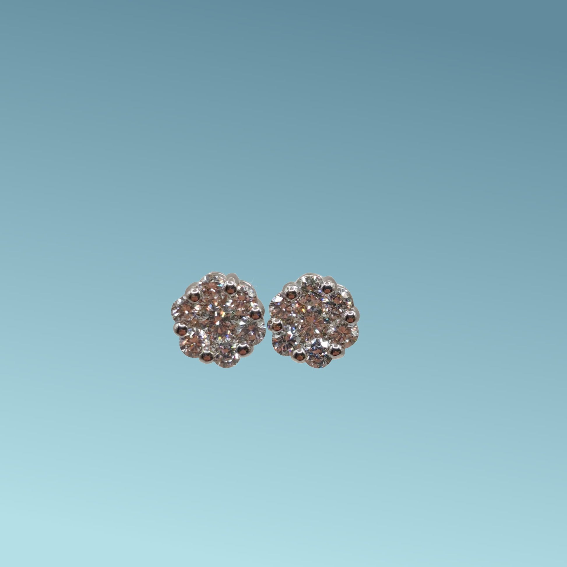 Orecchini Punto Luce Magic con Diamanti naturali taglio brillante ct 0,62 in Oro bianco 18 Kt