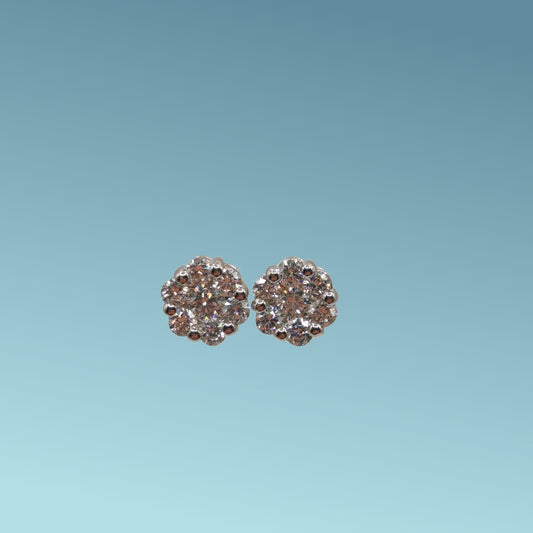 Orecchini Punto Luce Magic con Diamanti naturali taglio brillante ct 0,62 in Oro bianco 18 Kt