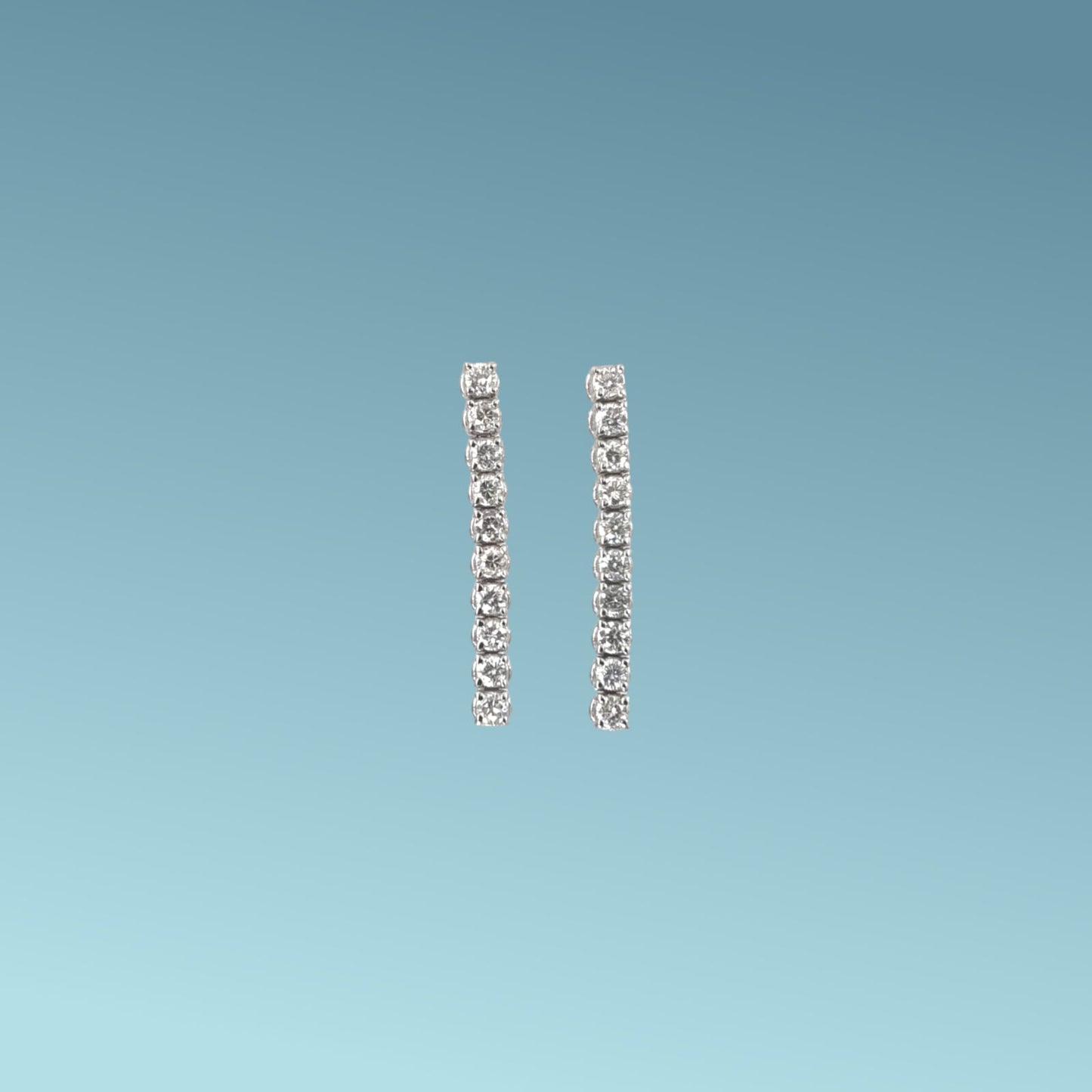 orecchini tennis morbidi  in oro bianco 18kt  di meteore gioielli presentano 10 diamanti naturali taglio brillante per ognuno per un totale di 0.37ct g/vs 
