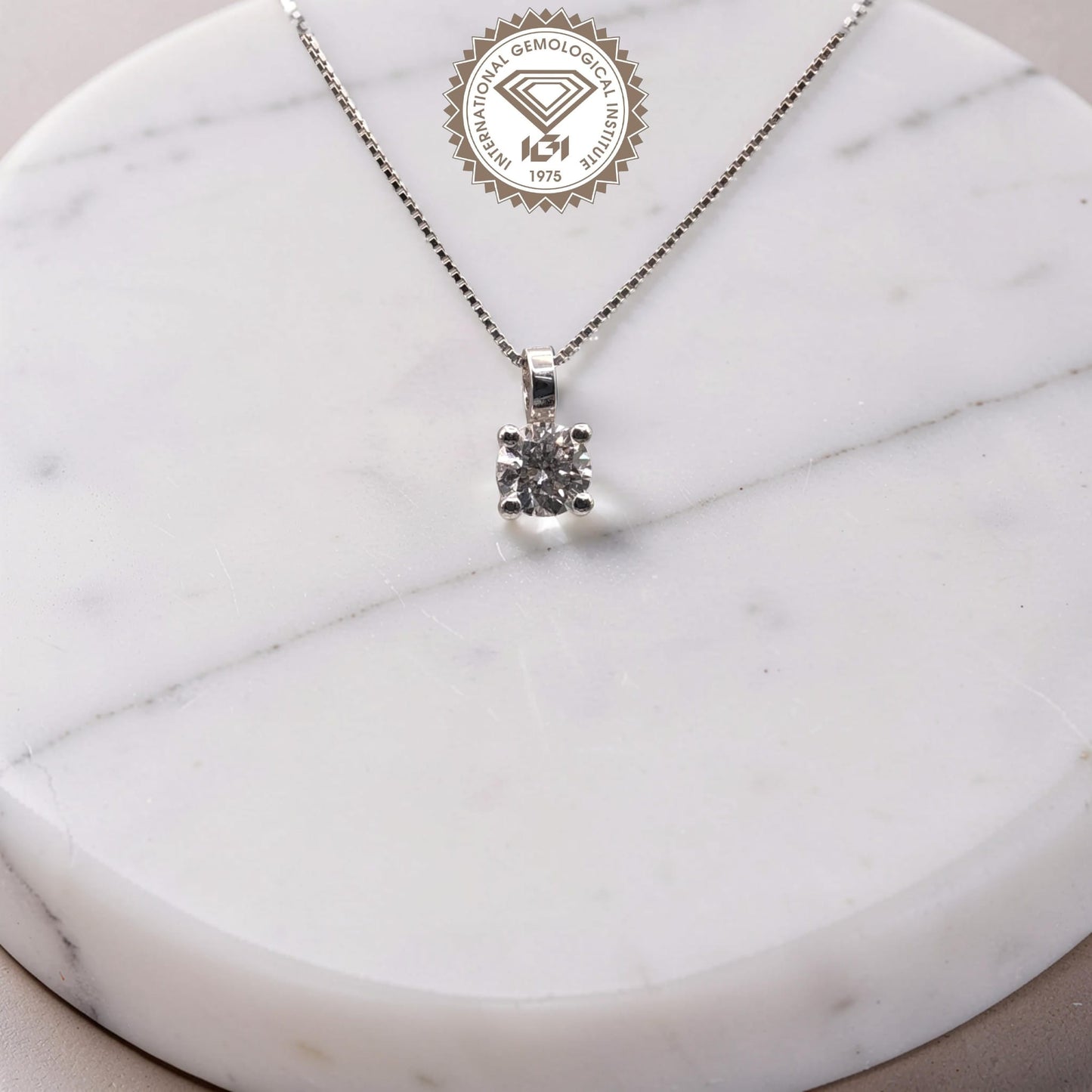 punto luce diamante 0.40 ct oro bianco 18 kt certificato igi d color si1