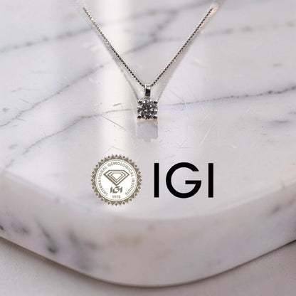 punto luce diamante 0.30 ct colore E SI1 oro bianco 18 kt certificato IGI